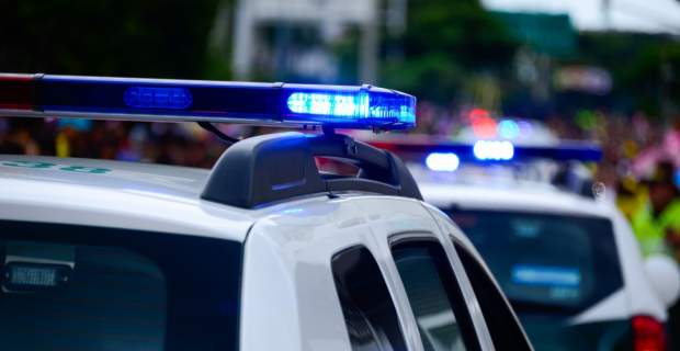 309398-car_police_cars_caravan_sirens_red_blue_lights_wallpaper-569310